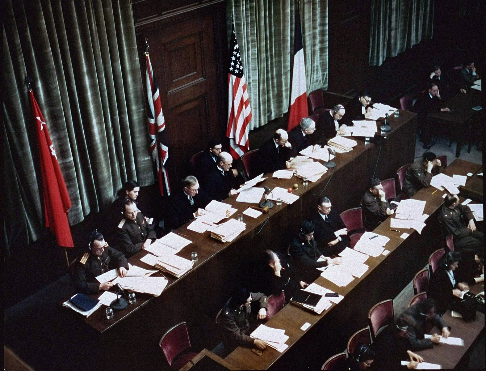 Judges bench during the Nuremberg trials. 
Source: United States Holocaust Memorial Museum